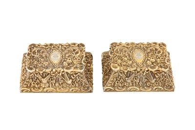 Lot 66 - Rothschild - A pair of Edwardian sterling silver gilt cast stamp double boxes, London 1901 by J Batson and Son