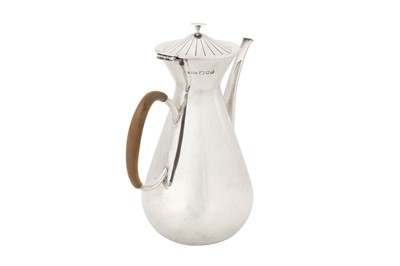 Lot 251 - An Elizabeth II sterling silver coffee pot, London 1957 by Asprey