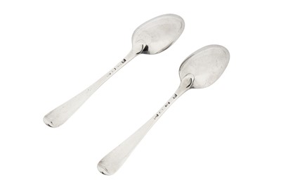 Lot 225 - A very rare pair of George III sterling silver tablespoons, London 1771 by Christopher Fly Woods and Thomas Filkin