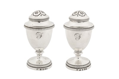Lot 172 - A pair of George III sterling silver pepper casters, London 1809 by Rebecca Emes and Edward Barnard I
