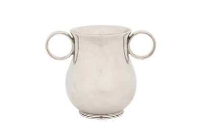 Lot 295 - A Victorian sterling silver 'Ox Eye' or college twin handled cup, London 1863 by George John Richards and Edward Charles Brown