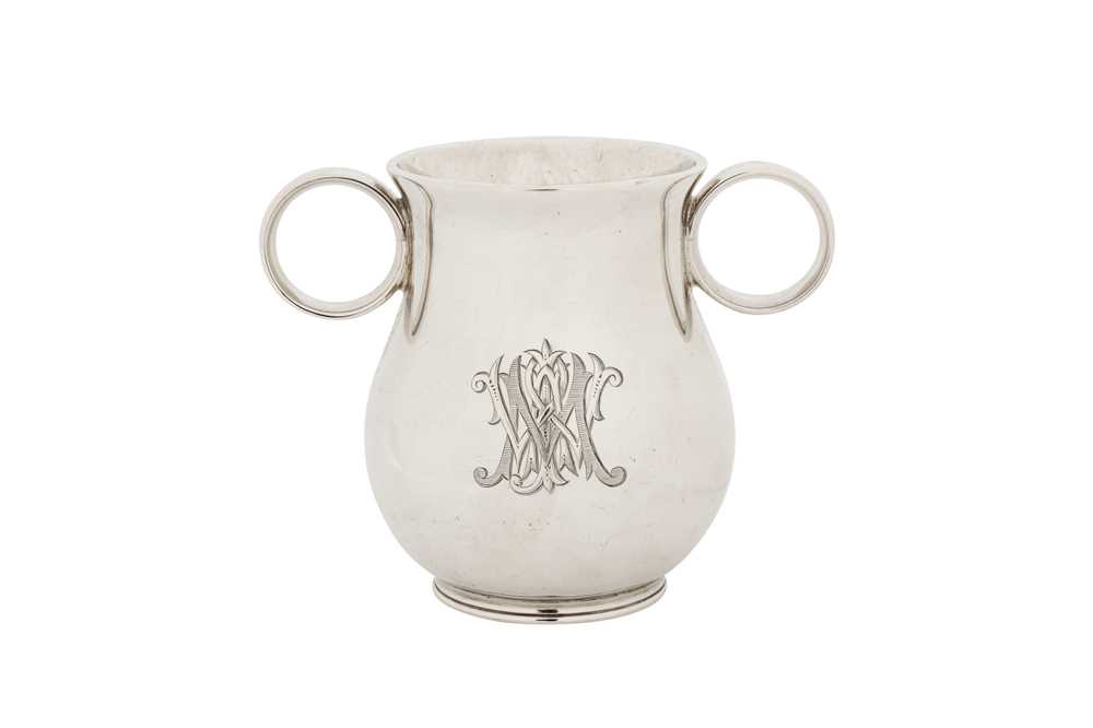 Lot 295 - A Victorian sterling silver 'Ox Eye' or college twin handled cup, London 1863 by George John Richards and Edward Charles Brown