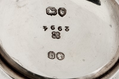 Lot 295 - A Victorian sterling silver 'Ox Eye' or college twin handled cup, London 1863 by George John Richards and Edward Charles Brown