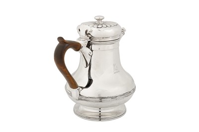 Lot 511 - A George IV sterling silver hot water jug, London 1825 by Richard Atkins and William Somersall overstruck by Edward Edwards II