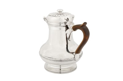 Lot 511 - A George IV sterling silver hot water jug, London 1825 by Richard Atkins and William Somersall overstruck by Edward Edwards II