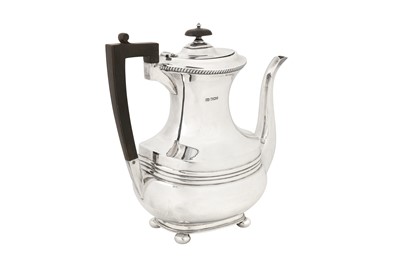 Lot 314 - A Victorian sterling silver four-piece tea and coffee service, Sheffield 1900 by George Howson