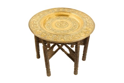 Lot 514 - AN INDIAN OCCASIONAL TABLE WITH A LARGE COPPER TRAY WITH THE ZODIAC SIGNS