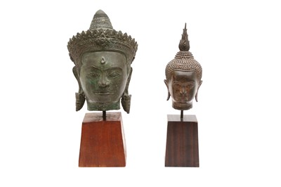 Lot 243 - TWO SOUTH EAST ASIAN BUDDHA HEADS