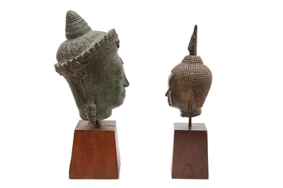 Lot 243 - TWO SOUTH EAST ASIAN BUDDHA HEADS