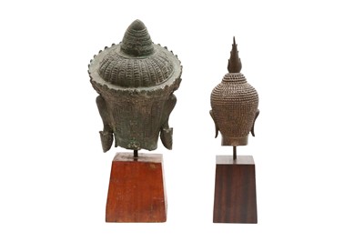 Lot 243 - TWO SOUTH EAST ASIAN BUDDHA HEADS