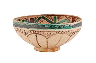Lot 317 - AN IRANIAN NISHAPUR MEDIEVAL-REVIVAL BLACK AND GREEN POTTERY BOWL