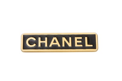 Lot 412 - Chanel Black 'CHANEL'  Plaque Brooch