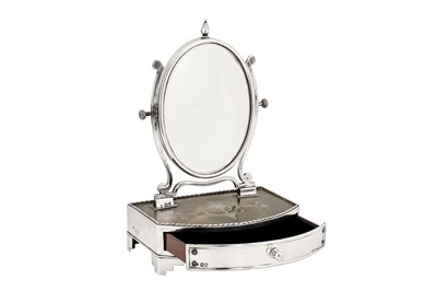 Lot 71 - An Edwardian sterling silver and tortoiseshell dressing mirror table and jewellery box, London 1902 by William Comyns