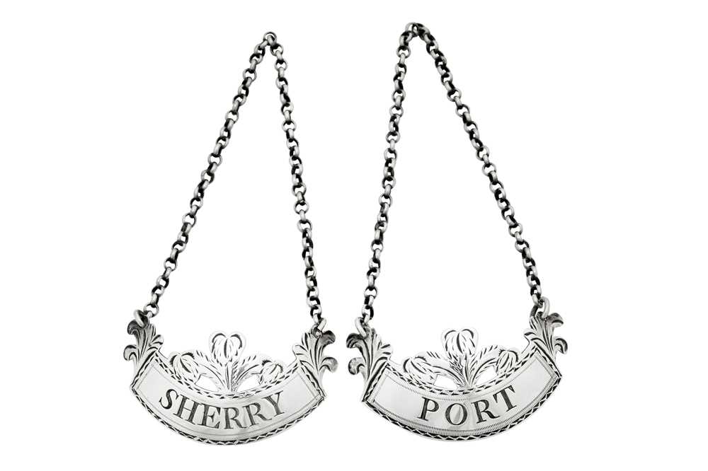 Lot 42 - A pair of George III sterling silver wine labels, London 1794 by Thomas Ollivant of Manchester overstriking Peter and Ann Bateman