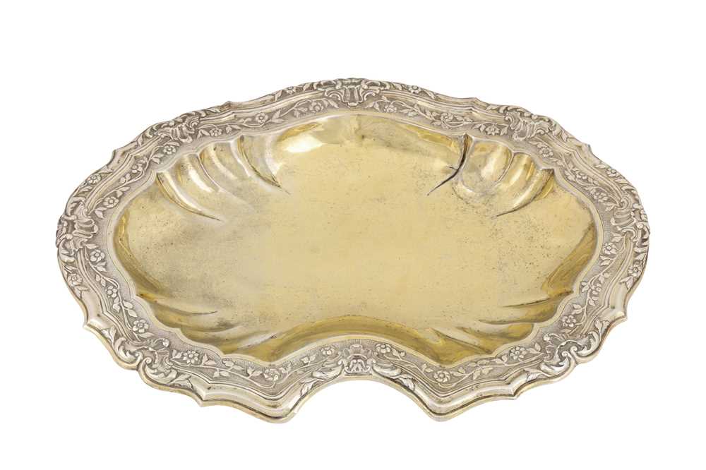 Lot 188 - A mid-18th century Portuguese silver gilt basin, Lisbon circa 1750 by L.I.E (unidentified, probably Vidal 2330)