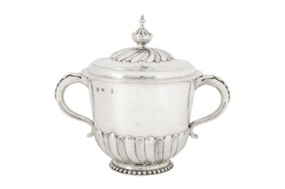 Lot 477 - A James II sterling silver twin handled covered porringer, London 1688 by Benjamin Pyne