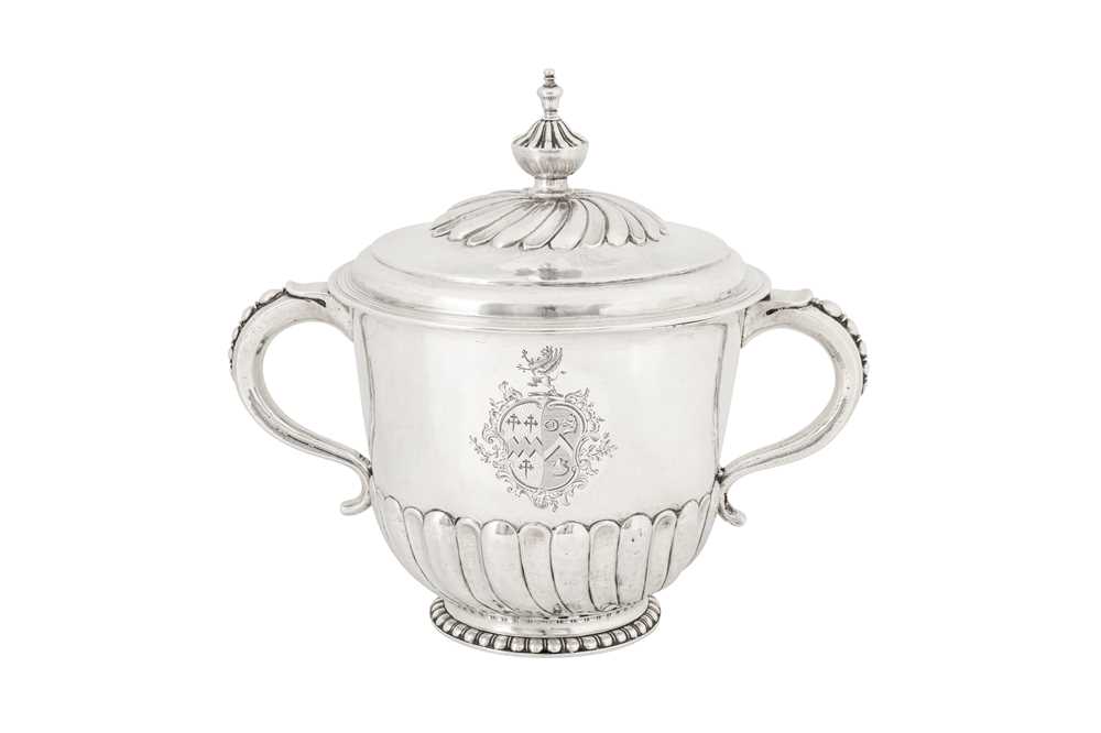 Lot 477 - A James II sterling silver twin handled covered porringer, London 1688 by Benjamin Pyne