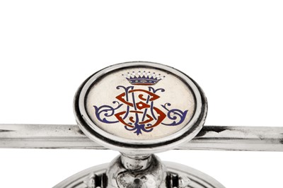 Lot 185 - A pair of Alexander III late 19th century Russian 84 zolotnik silver and enamel twin candlesticks, Saint Petersburg circa 1886 by Friedrich Emil Henrichsen