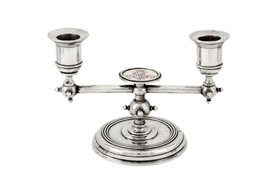 Lot 185 - A pair of Alexander III late 19th century Russian 84 zolotnik silver and enamel twin candlesticks, Saint Petersburg circa 1886 by Friedrich Emil Henrichsen
