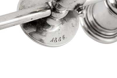 Lot 185 - A pair of Alexander III late 19th century Russian 84 zolotnik silver and enamel twin candlesticks, Saint Petersburg circa 1886 by Friedrich Emil Henrichsen