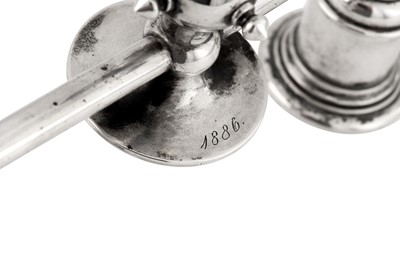 Lot 185 - A pair of Alexander III late 19th century Russian 84 zolotnik silver and enamel twin candlesticks, Saint Petersburg circa 1886 by Friedrich Emil Henrichsen