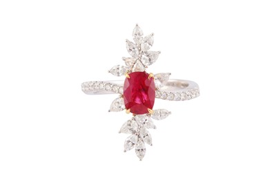 Lot 214 - A RUBY AND DIAMOND RING