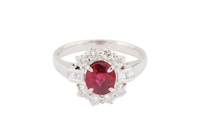 Lot 191 - A RUBY AND DIAMOND CLUSTER RING