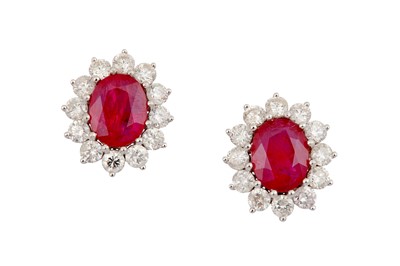 Lot 207 - A PAIR OF RUBY AND DIAMOND CLUSTER EARRINGS