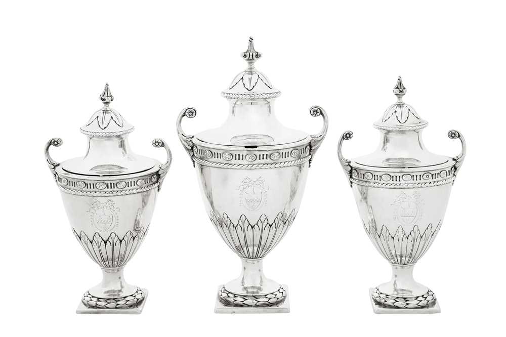 Lot 448 - A set of three George III sterling silver condiment and sugar vases, London 1776 by Pierre or Peter Gillois (reg. 20th Nov 1754)