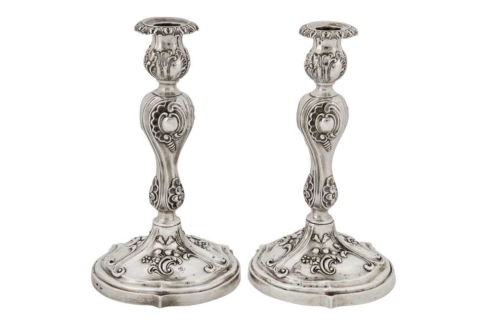 Lot 183 - A pair of Alexander II mid-19th century Russian 84 zolotnik silver candlesticks, Moscow 1871 by J.T.