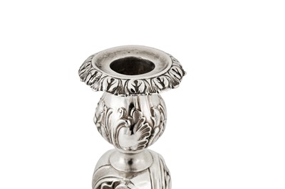 Lot 183 - A pair of Alexander II mid-19th century Russian 84 zolotnik silver candlesticks, Moscow 1871 by J.T.