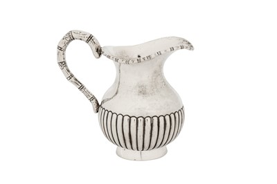 Lot 145 - An early 20th century Chinese Export silver milk or cream jug, Canton circa 1920 by Da Ji, retailed by Wang Hing