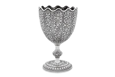 Lot 117 - An early 20th century Anglo – Indian silver standing cup or goblet, Cutch, Bhuj dated 1911 by Oomersi Mawji jnr (active 1890-1930)