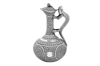 Lot 98 - An early 20th century Anglo – Indian silver claret jug or ewer, Cutch circa 1910