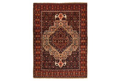 Lot 22 - AN ANTIQUE SENNEH RUG, WEST PERSIA