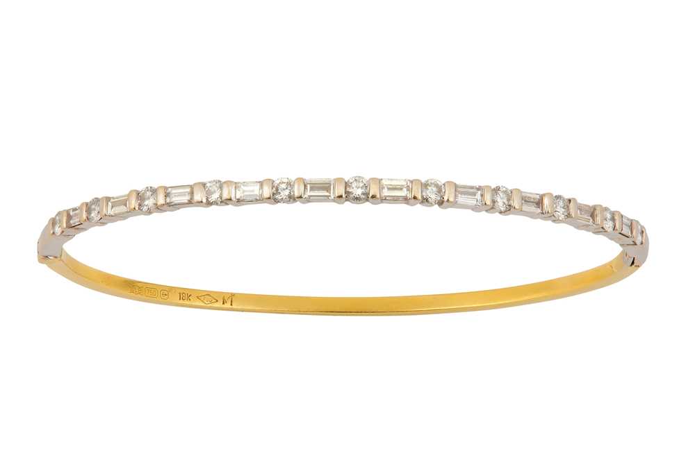 Lot 102 - A DIAMOND BANGLE