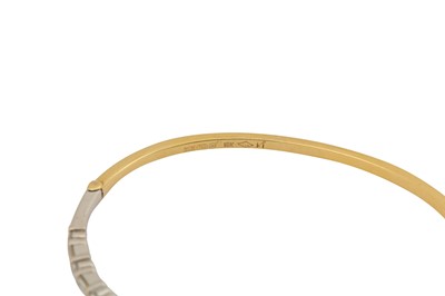 Lot 102 - A DIAMOND BANGLE