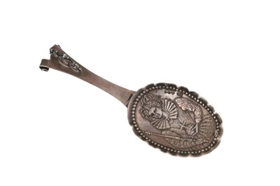 Lot 140 - An early 20th century German silver caddy spoon, Hanau by Neresheimer, import marks for London 1910 by Berthold Muller