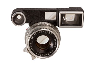 Lot 416 - A Leitz 35mm f/2 Summicron lens w/ Ocular Attachment