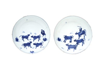 Lot 59 - A PAIR OF CHINESE BLUE AND WHITE KO-SOMETSUKE 'OXHERD' DISHES