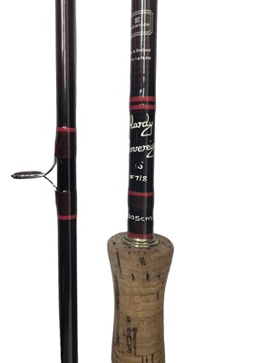 Lot 185 - TWO FISHING RODS AND THREE REELS