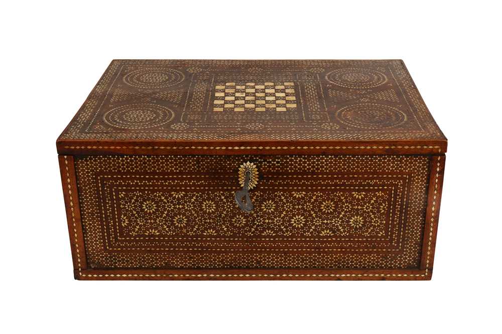 Lot 247 - λ A HISPANO-MORESQUE MUDEJAR IVORY-INLAID WALNUT SCRIBE'S CHEST