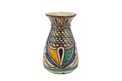 Lot 235 - A SMALL TUNISIAN POLYCHROME-PAINTED CHEMLA POTTERY VASE