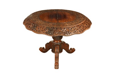 Lot 511 - AN INDO-PORTUGUESE CARVED HARDWOOD TABLE