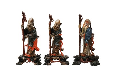 Lot 863 - THREE CHINESE FUZHOU (FOOCHOW) LACQUER FIGURES OF SHOU LAO