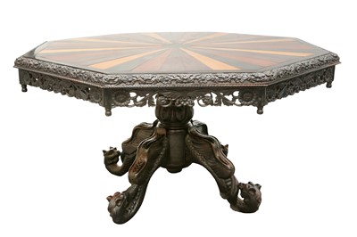 Lot 509 - AN IMPRESSIVE AND VERY LARGE ANGLO-INDIAN EBONY AND SPECIMEN WOOD-INLAID CENTRE TABLE