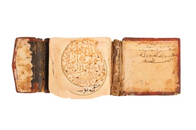 Lot 230 - THREE RELIGIOUS MANUSCRIPTS IN MAGHRIBI SCRIPT