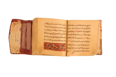 Lot 230 - THREE RELIGIOUS MANUSCRIPTS IN MAGHRIBI SCRIPT