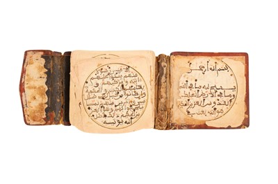 Lot 230 - THREE RELIGIOUS MANUSCRIPTS IN MAGHRIBI SCRIPT