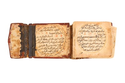 Lot 230 - THREE RELIGIOUS MANUSCRIPTS IN MAGHRIBI SCRIPT